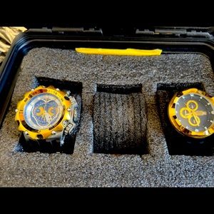 Two invicta watches and the case